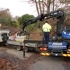 Transefer of landscaping materials to on-site transport